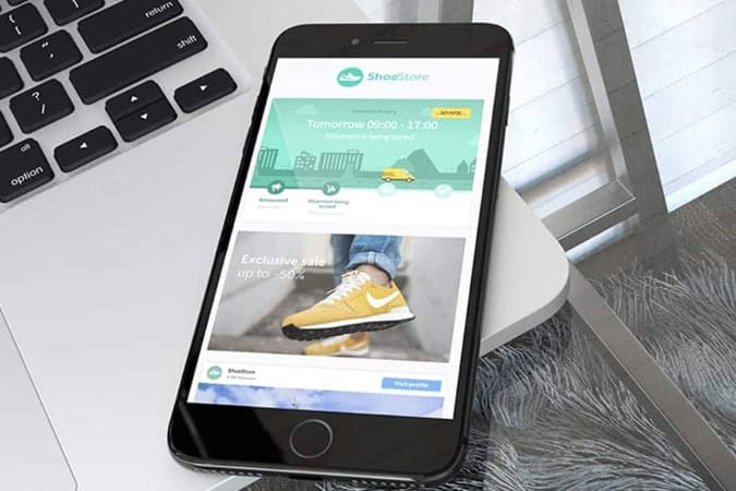 phone showing a branded tracking page as a post purchase upsell example